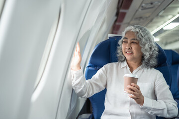 Happy Mature woman airplane travel,  Portrait of woman with journey.