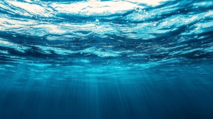 Obraz premium beautiful blue sea or ocean water surface and underwater