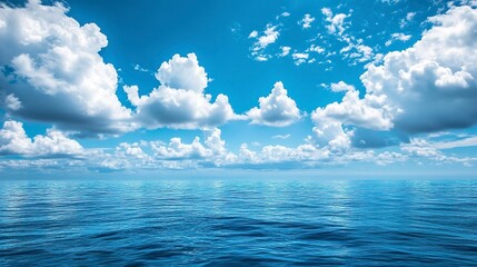 Obraz premium Beautiful blue ocean with blue sky and clouds background