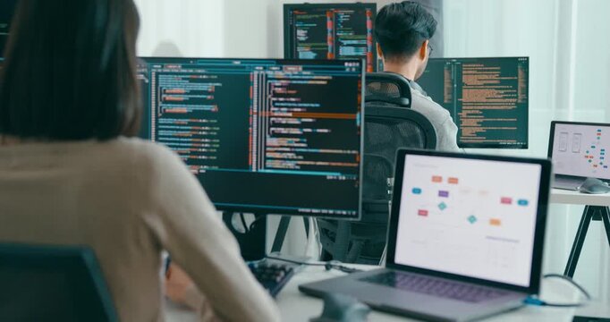 Closeup Adult Asia male, female freelance typing write prompt AI bot IT app smart program nomad, video game, terminal with coding language, user interface, designer, big data center desktop computer.