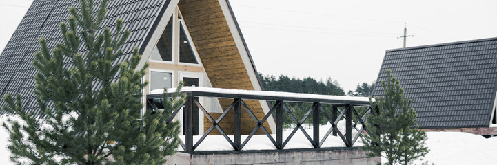 A country house in nature in winter. Rest in an ecologically clean place in winter. Glamping in nature.