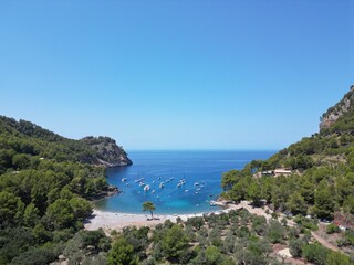 Cala Tuent Bay with Yachts Anchored in Mallorca's Serene Mountainous Coastline