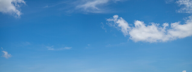 Beautiful blue sky and white cumulus clouds abstract background. Cloudscape background. Blue sky and fluffy white clouds on sunny days. Blue sky and daylight. World Ozone Day. Ozone layer. Summer sky.