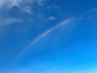 Fototapeta premium Rainbow with sunny blue sky