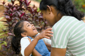 Naklejka premium Pure Joy Mother and Daughter Laughter
