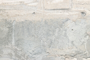 Texture of a wall with putty, concrete. Background of the exterior wall of a house during...