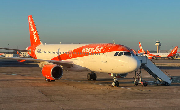 EasyJet Airbus A320 With Passenger Boarding Stairs at Sunrise