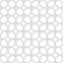 Naklejka premium Seamless geometric pattern, consisting of interlocking circle outlines on a white background. Suitable for digital graphics, interior design, textiles, printing, etc.