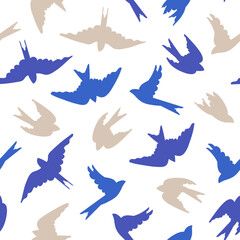 Seamless pattern with swallow birds in blue and beige on a white background. Vector illustration.