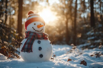 Obraz premium A snowman with scarf and hat standing in a snowy forest
