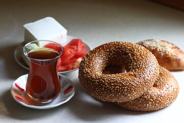 Turkish breakfast with tea, bagels (simit), pogaca, feta cheese