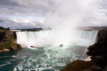 Boat in the mist of the Niagara Falls Canada