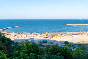 Black Sea Modern Beach on a sunny day with a blue sky,Constanta beach at Black Sea,panoramic view Constanta Romania