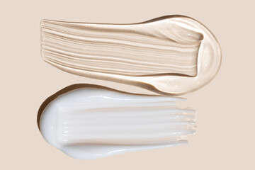Cream and gel texture strokes isolated on beige background. Facial creme, gel or body lotion...