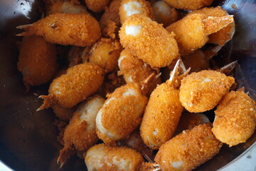 Deep-fried surimi. Fried crab claws. Surimi Crab Claw and battered fish snacks