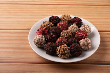 truffle, photo, show, assortment, assorted, chocolate, placed, product, cacao, handmade, gourmet, background, shape, luxury, decorated, elegant, nut, drizzle, topping