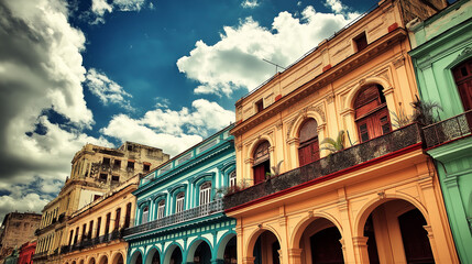 Fototapeta premium Colorful colonial architecture under a cloudy sky in Havana, Cuba.