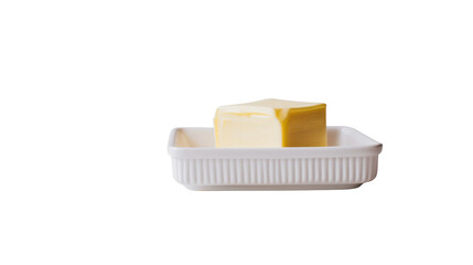  A block of butter sits in a white ceramic dish_Transparent background PNG