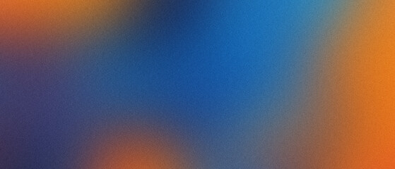 Abstract blurred gradient background with vibrant blue and orange color blend