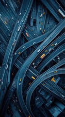 Obraz premium Aerial of a city intersection, where multiple roads converge, and traffic moves in synchronized patterns, emphasizing the complexity of urban infrastructure