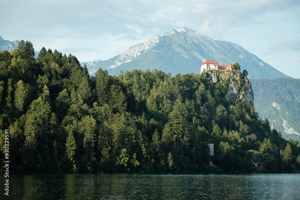 Wall mural medieval castle built above the bled lake, slovenia