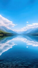 Obraz premium A hyper-lapse of a tranquil lake with reflections of surrounding mountains and moving clouds on the water's surface, emphasizing the peacefulness of the natural environment