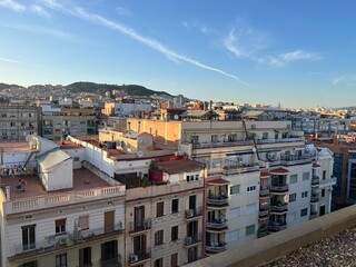 Barcelona skyline during golden hour in Eixample neighborhood