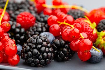 Berries. Various colorful berries Strawberry, Raspberry, Blackberry, Blueberry close-up Bio Fruits, Healthy eating,