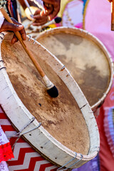 Rustic and colorful wooden drums at an Afro-Brazilian cultural event on the streets of Brazil