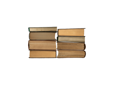 Two stacks of old books are isolated.