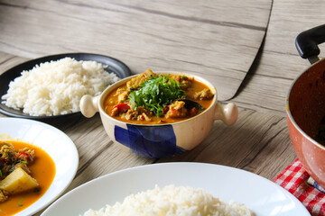 Traditional fish cooking. The fish pieces is cooked with spices and finally garnished with green coriander. 
