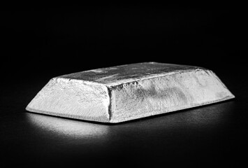 ingot or zinc bar isolated on insulated black background, metal