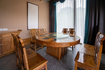 Round tables and chairs in the hotel restaurant
