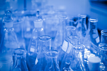 In the chemistry lab, scientists are doing chemical experiments with test tubes