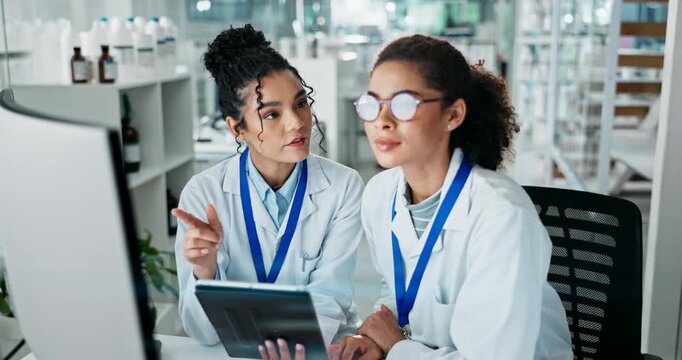 Women, scientist and happy at lab on computer for medical research with teamwork and collaboration. Employees, smile and conversation with online discovery for science, medicine and drug trial