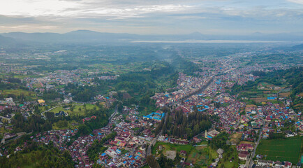 Aerial drone view of greenery countryside scenery in Berastagi, North Sumatra, Indonesia. 