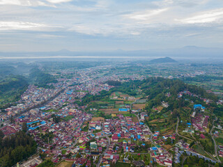 Aerial drone view of greenery countryside scenery in Berastagi, North Sumatra, Indonesia. 