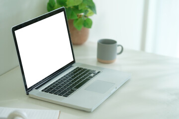Fototapeta premium Workspace desk and laptop. copy space and blank screen.