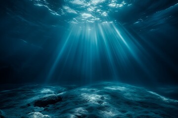 Underwater scene illuminated by rays of light, showcasing the ocean's serene depths.
