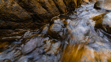 water flowing over rocks