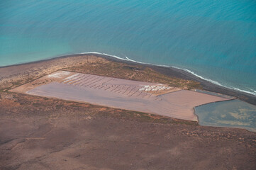 Sea salt distillery in Lanzarote. Lanzarote landscape from above. Beautiful landscape with ocean in Lanzarote. Sea salt