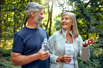 A Happy Couple Enjoying a Great Refreshing Hike Together in Natures Beautiful Scenery