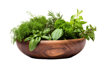 Fresh green herbs and spices from wooden bowl, isolated on white background.