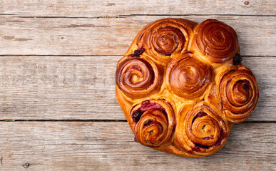 Homemade cake pie roll with cherry . Food background