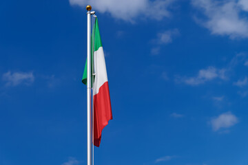 Italy flag on a flagpole, windless, no wind