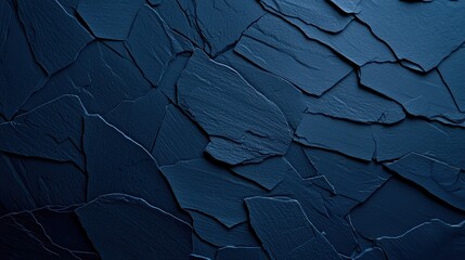 Dark blue slate rock texture background with rough, cracked layers of stone, creating a natural, rugged surface. Ideal for nature, geology, or abstract design projects.