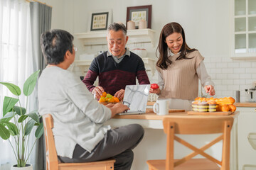 mother day family relation bonding at home asian family mother father and daughter enjoy cuddle conversation morning lifestyle hapiness joyful moment while stay at kitchen area home love bonding