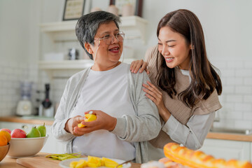 mother day family relation bonding at home asian family mother father and daughter enjoy cuddle...