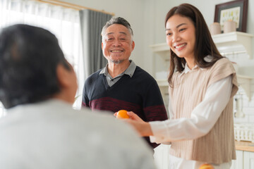 mother day family relation bonding at home asian family mother father and daughter enjoy cuddle...