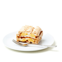 Delicious Meringue Layer Cake on White Plate with Fork
